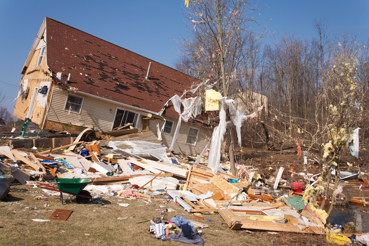 Photo of a home in Michigan that has been severely damaged and is in need of restoration.