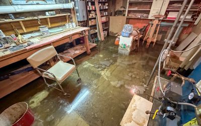 A Basement Workshop Flooded After A Major Leak Requiring The Usage Of Content Restoration.