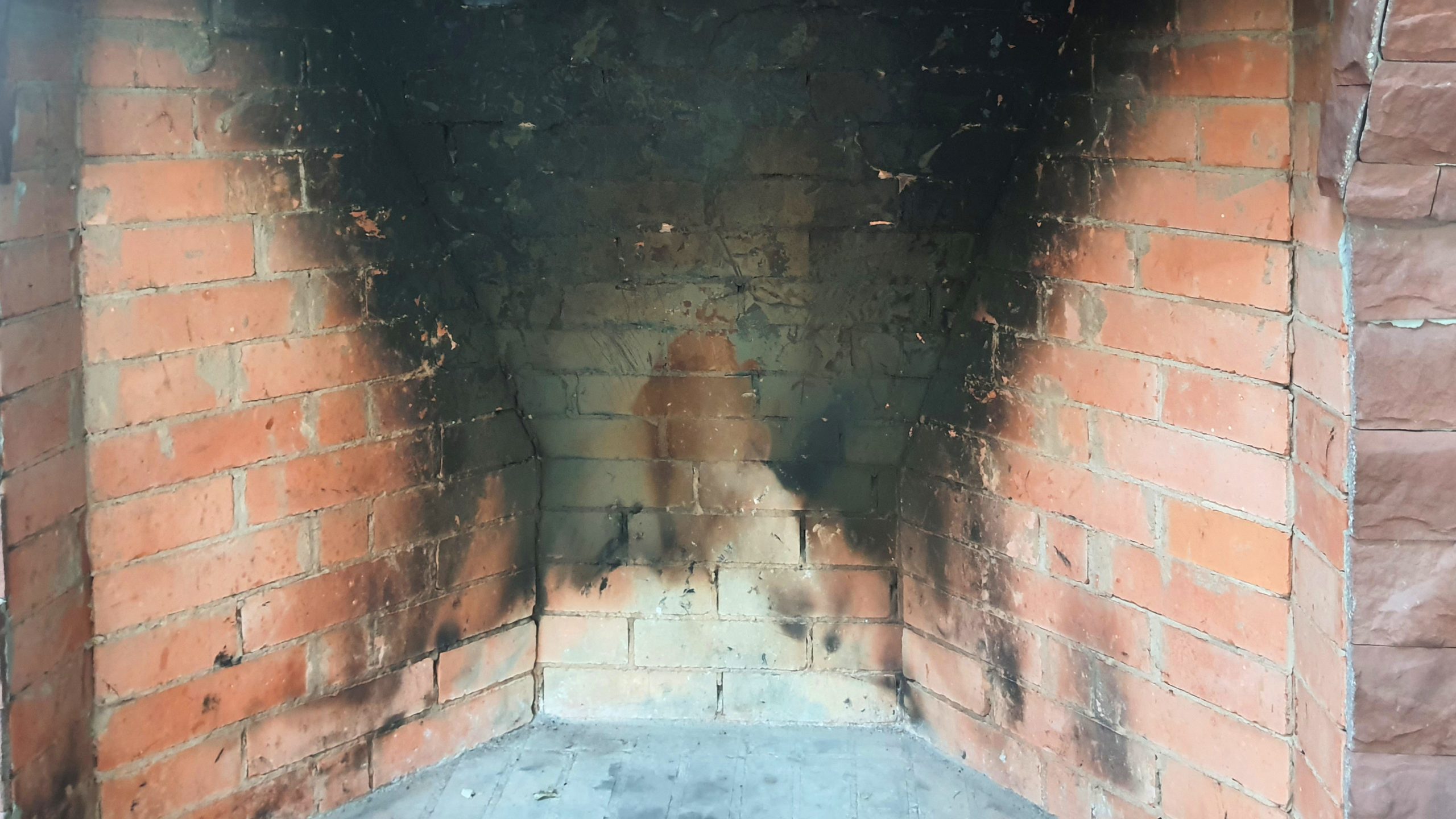 Creosote buildup in chimney that could lead to a fire and cause issue for homeowners.